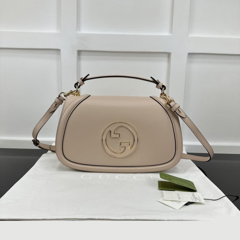 G*u*i top handle bags